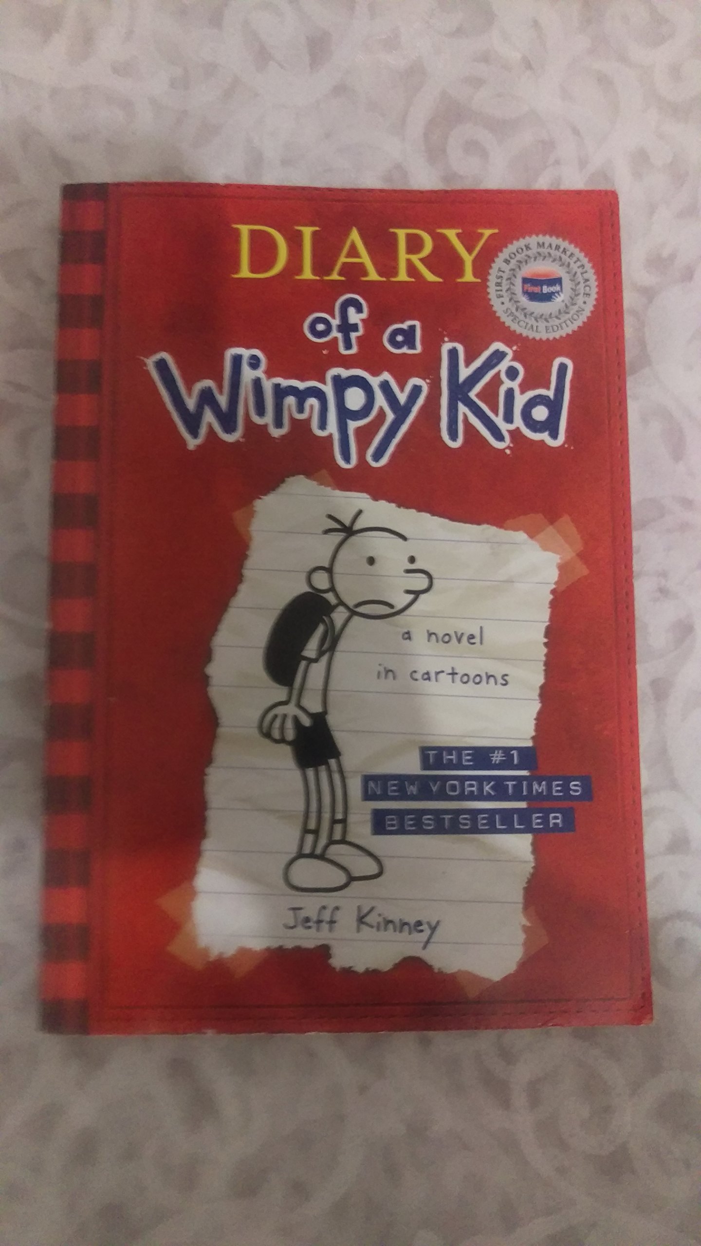 Diary of a Wimpy Kid 1: a Novel in Cartoons